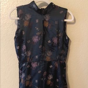 Floor length asian print dress.